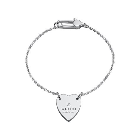 gucci heart bracelet with trademark.